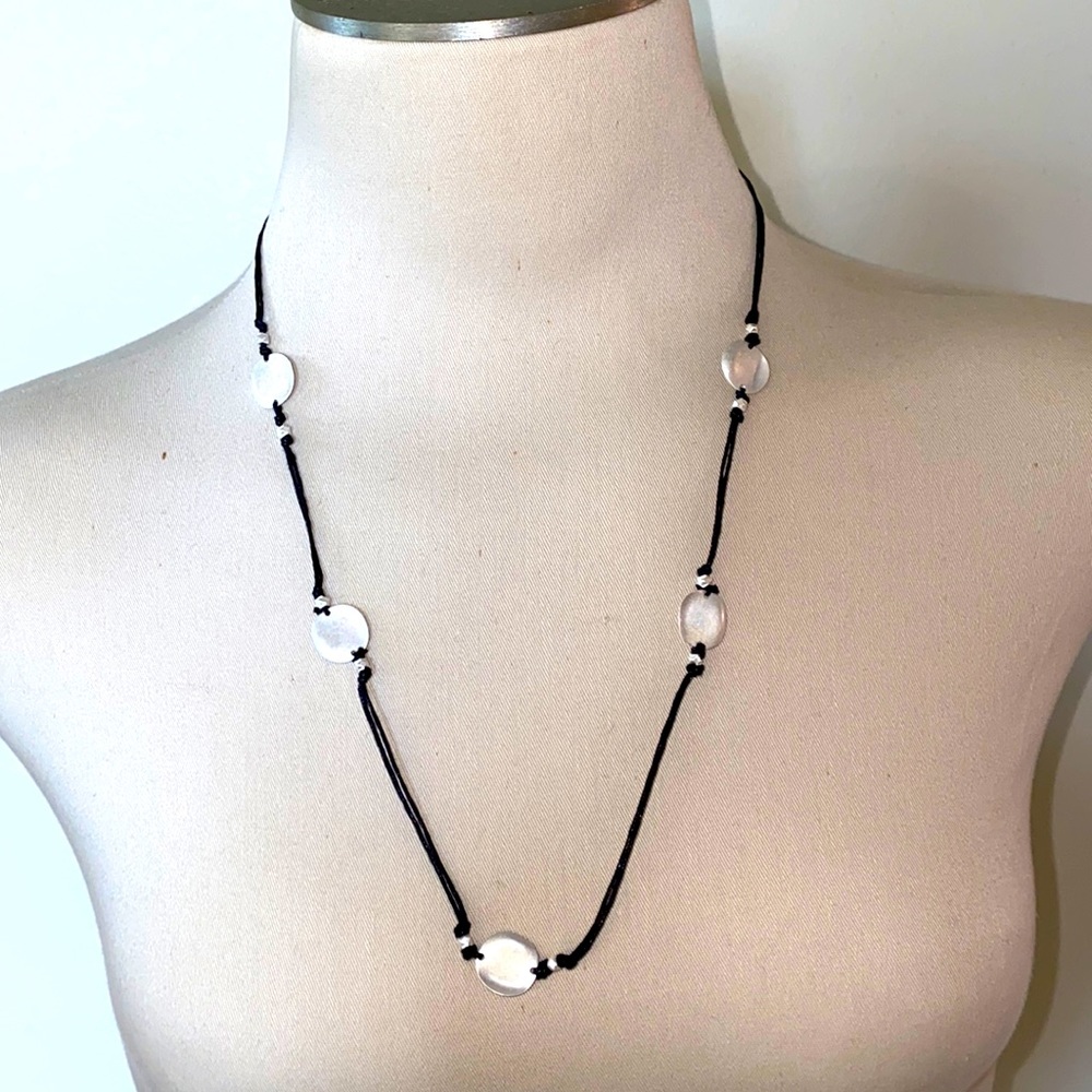 Long necklace with sterling silver disks